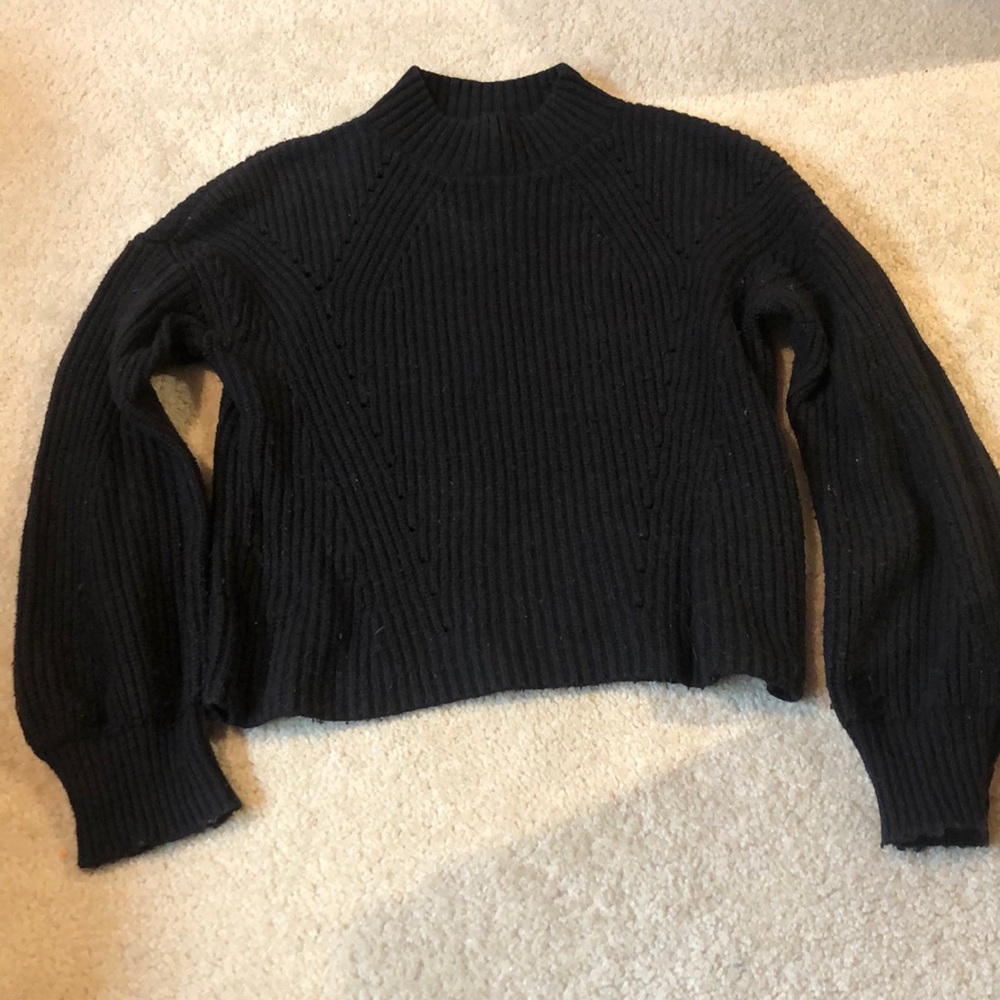Black, cropped bell sleeve knit sweater